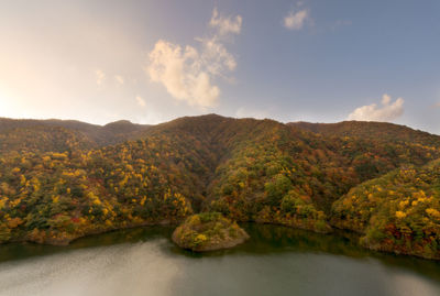 Scenic view of lake against sky during autumn