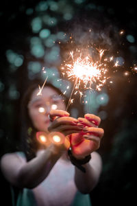 Firework display at night