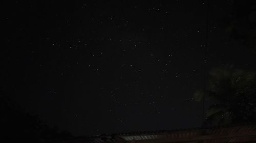 Low angle view of stars in sky at night