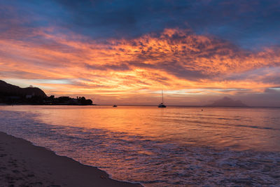 Scenic view of sea against sky during sunset