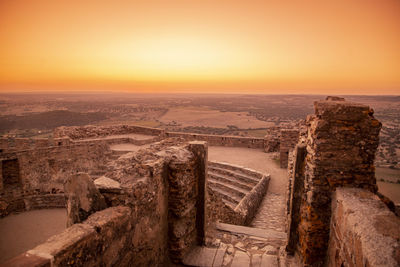 High angle view of townscape against sky during sunset