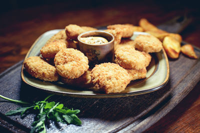 Close-up of fried food in plate on table