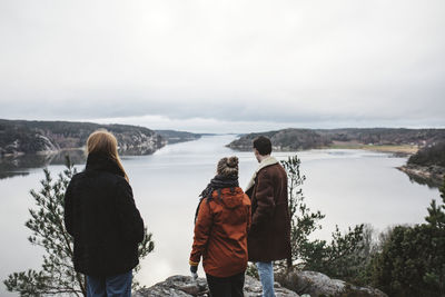 Friends looking at sea