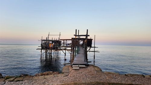 Scenic view of sea against sky at sunset