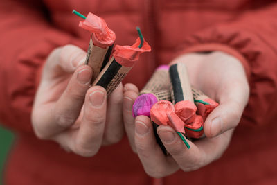 Close-up of woman holding hands