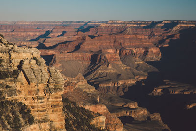 Aerial view of rock formations against sky