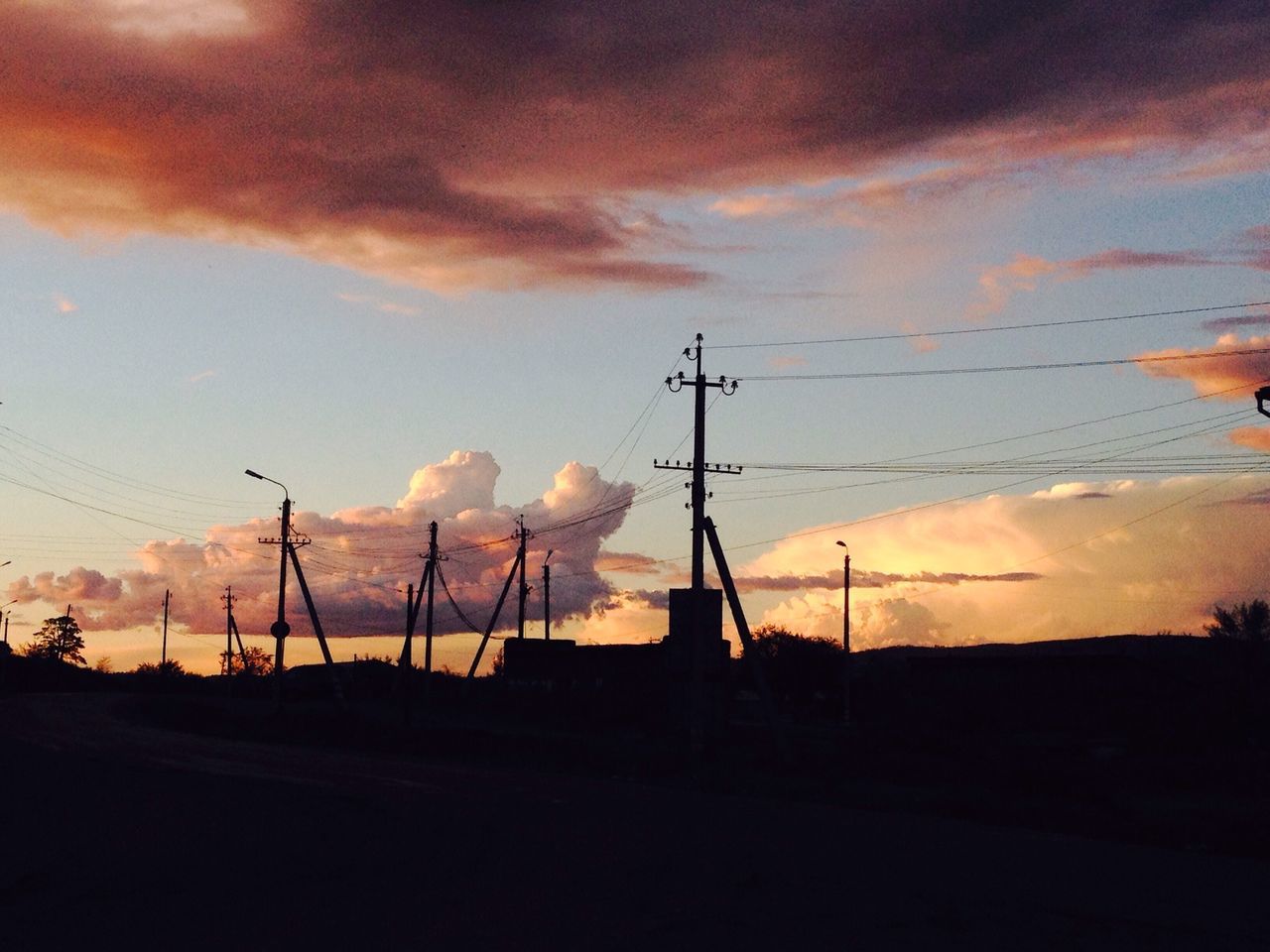 sunset, silhouette, sky, electricity pylon, power line, cloud - sky, electricity, power supply, fuel and power generation, cloud, cloudy, connection, dramatic sky, orange color, landscape, technology, scenics, beauty in nature, cable, nature