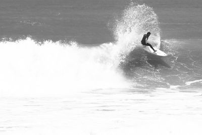 Man surfing in sea