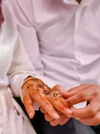 Midsection of woman holding food