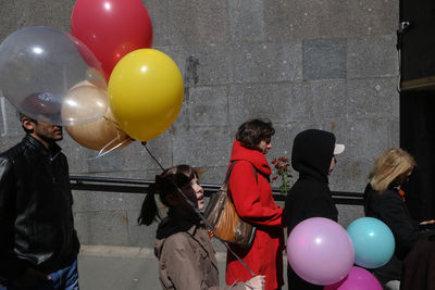 People looking at balloons