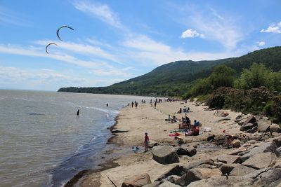 People enjoying on beach