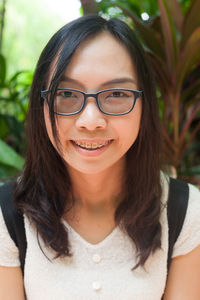 Portrait of smiling young woman