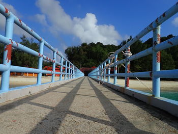 Empty bridge against sky