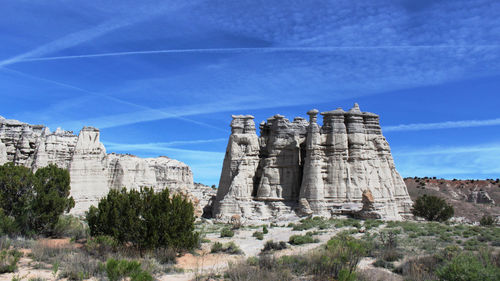 Low angle view of historical building against blue sky