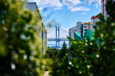 Close-up of electricity pylon against cloudy sky