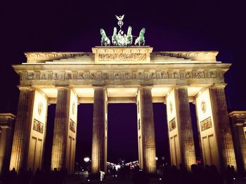 Low angle view of brandenburg gate at night