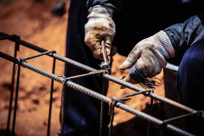 Man working on metal structure