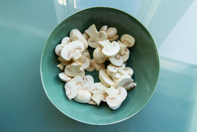 High angle view of chopped vegetables in bowl on table