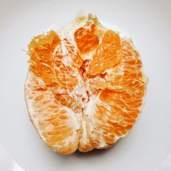 Close-up of fruit over white background