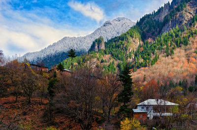 Scenic view of mountains against sky during autumn