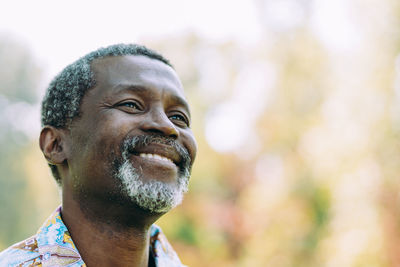 Close-up portrait of man looking away