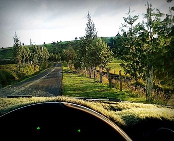 Road seen through car windshield