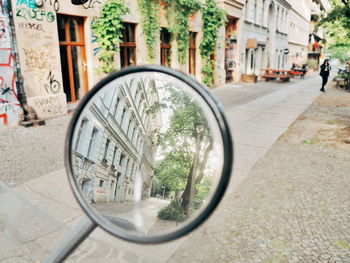 Reflection of building on street