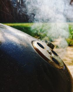 High angle view of cigarette on field