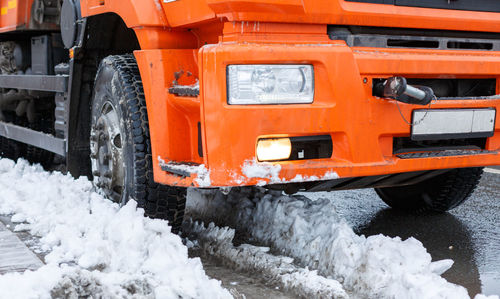 Close-up of snow covered car