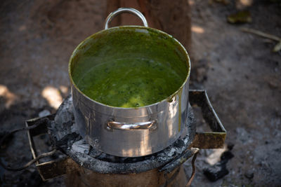 High angle view of drink on metal container