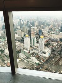 High angle view of modern buildings in city