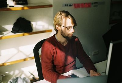 Portrait of young man working