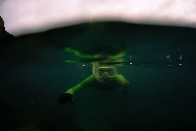 Man swimming in sea