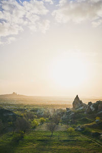 Scenic view of landscape against sky during sunset