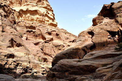 Low angle view of rock formations in jordan