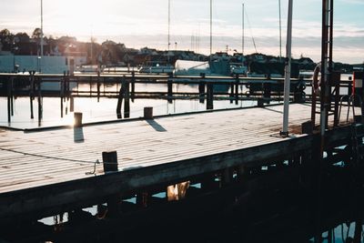 View of pier over lake against sky