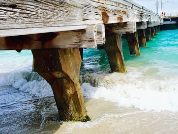 View of wooden pier in sea