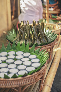 Vegetables in basket for sale at market stall