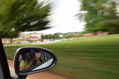 Reflection of car on road