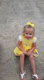 Portrait of girl playing with toy