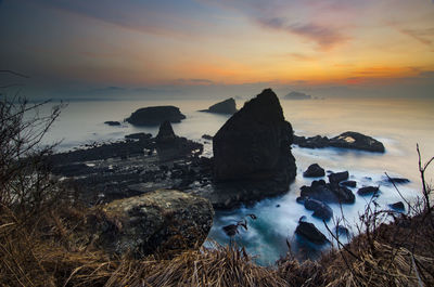 Scenic view of sea against sky during sunset