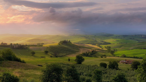 Scenic view of landscape against sky during sunset