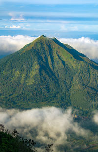 Scenic view of volcanic mountain against sky