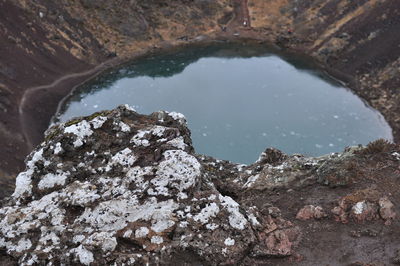 High angle view of rock formation in sea