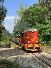 Train on railroad track against sky