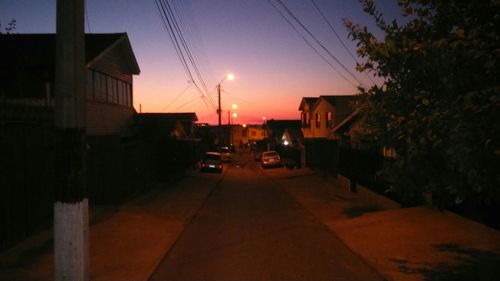 Illuminated street lights at night