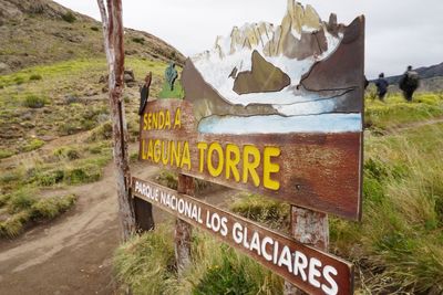 Information sign on field by road