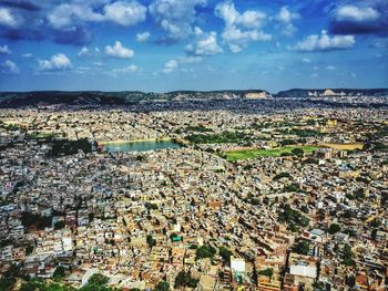 Aerial view of town against sky