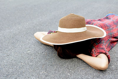 Woman lying on ground