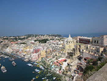 High angle shot of townscape against clear blue sky